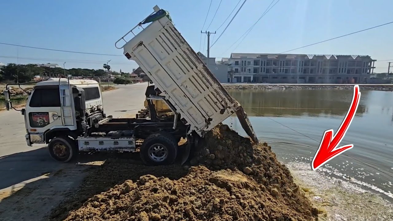 Thousands of Tons of Dirt Dumped Into Water – Heavy Equipment Power!