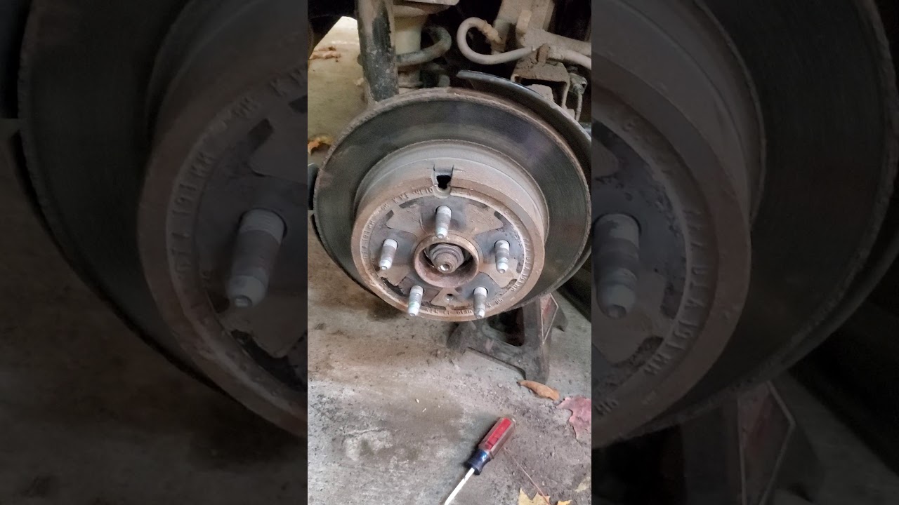 2010-2017 chevy equinox stuck rear rotor. - YouTube