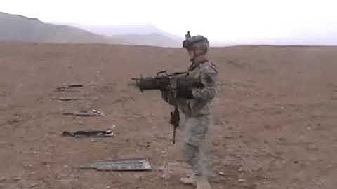 Army Soldier dual wields some M249