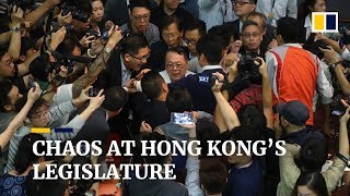 Hong kong extradition bill battle descends into chaos, leaving
lawmaker injured