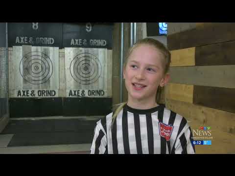 10-year-old Canadian becomes youngest certified axe throwing judge in the world