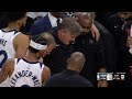 Wolves Coach Chris Finch had to be helped to the locker room after collision with Mike Conley