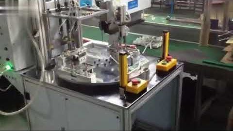 Multi spindle rotary indexing screw drive machine