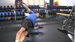 Side Plank with Reverse Cable Flye