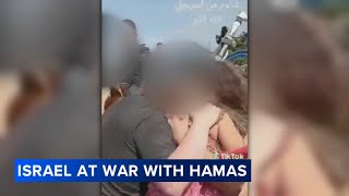 Man says video shows his wife, daughters taken hostage by Hamas