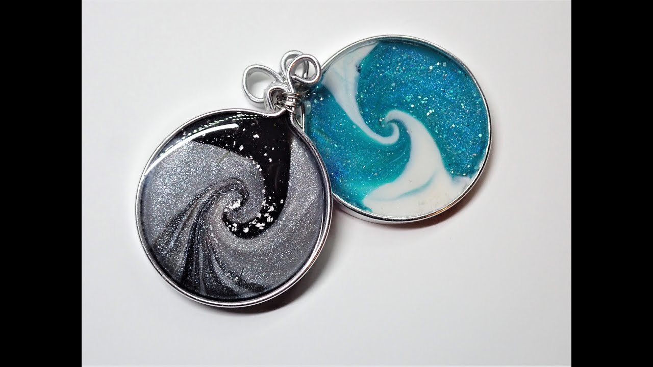 Wire wrapped polymer clay swirl pendant