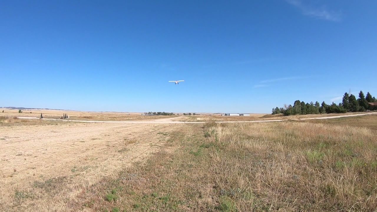 Piper Super Cub comes back for a visit to the Calhan Colorado Airport on a beautiful Saturday.