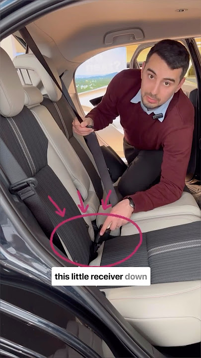 How to detach the middle car seat belt.