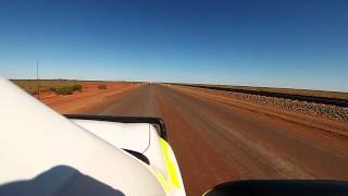 FMG Rail access rd with traffic 0513