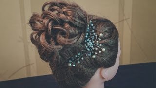 Updo hairstyle. Hair bun. Hairstyle for long hair