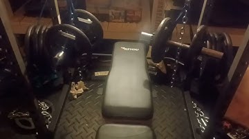 Dumbell Safety Setup. Barbell, soft loop tie down straps and chains