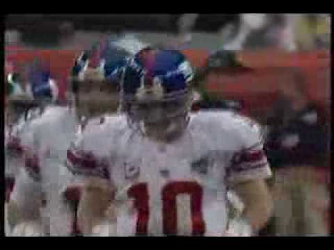 Eli Manning catches a very focused Tom Brady off guard.