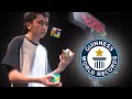 Solving three puzzle cubes whilst juggling  guinness world records