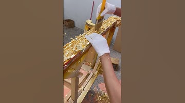 Every brush stroke brings the frame to life — gold leaf gilding, where patience meets precision.
