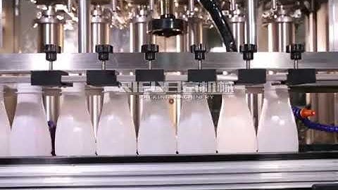 Automatic bottle liquid filling capping and labeling machine