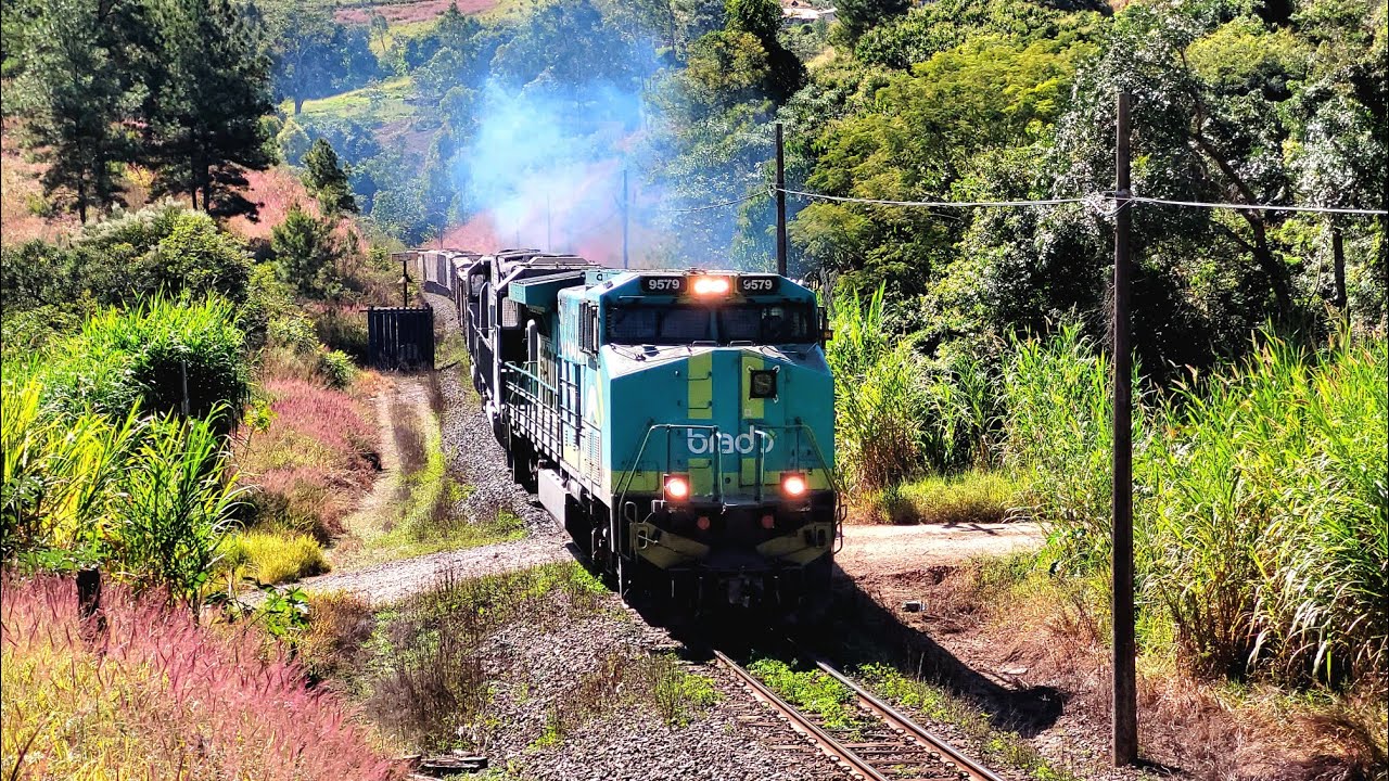 Trem locotrol de DASH-9 e SD40 inciando aceleração na rampa do KM 489
