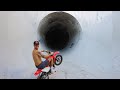 Riding Dirt Bikes Inside Massive Full Pipe! (100ft UNDERGROUND)