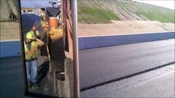 Asphalt paving from load to unload a drivers view