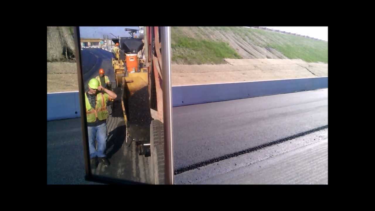 Asphalt Paving From Load To Unload A Drivers View