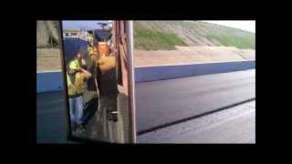 Asphalt paving from load to unload a drivers view