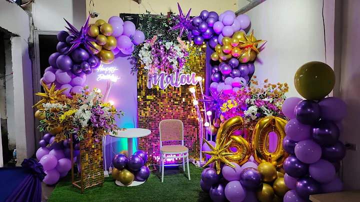 Purple and gold balloons backdrop design 