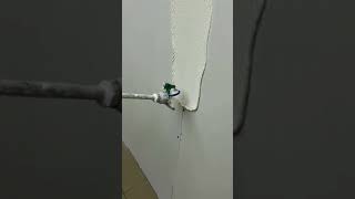 Spraying on Drywall Mud with the Graco Mark V