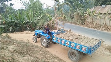 Soil Loading And Unloading On Over The Rough Through Roads Hills Digital Unload Facility of Tractor