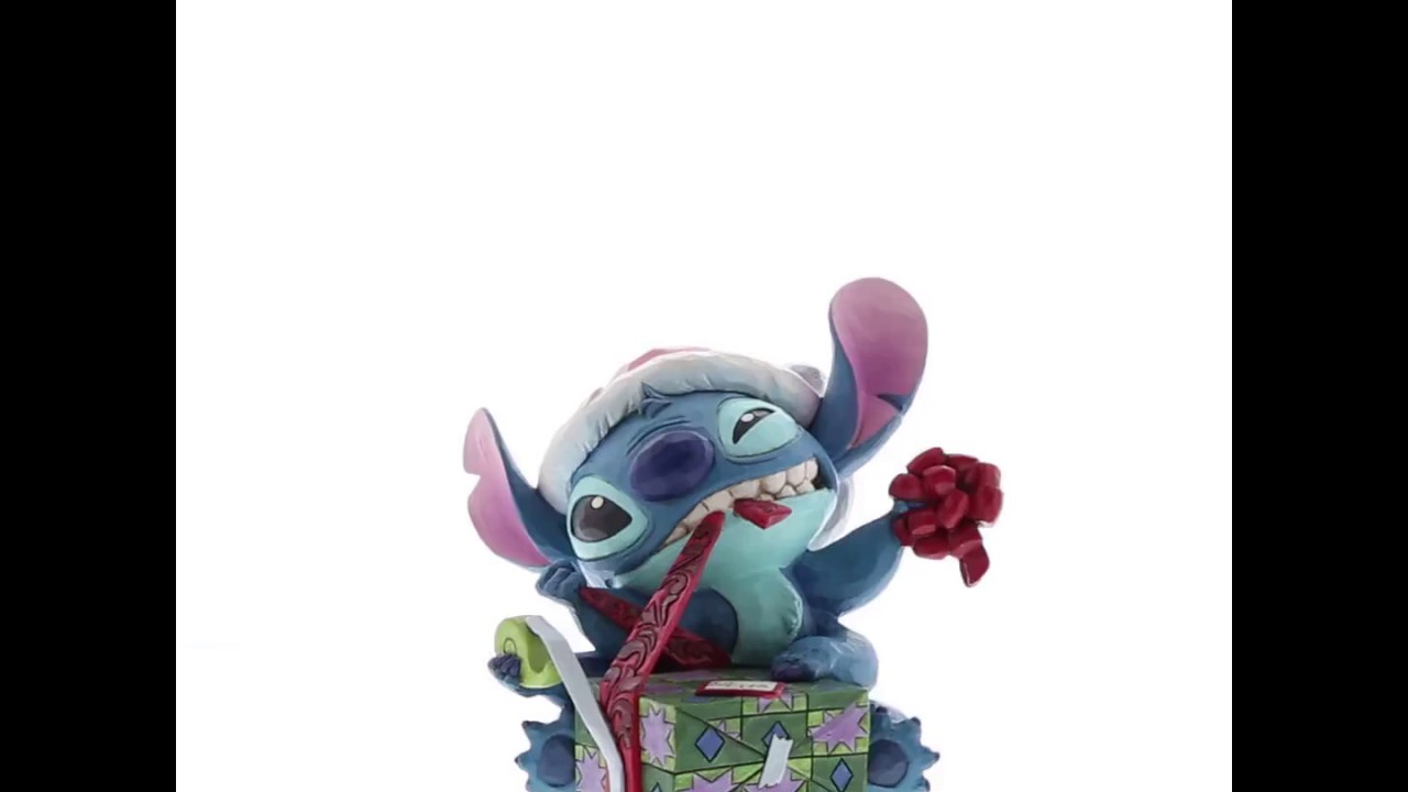 Disney Traditions Stitch with Santa Hat Figurine