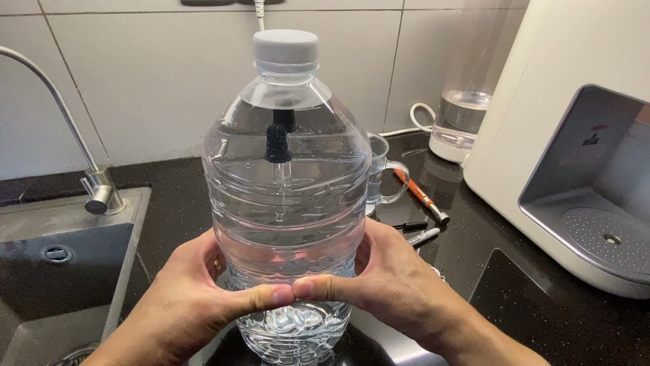 Cartesian Diver experiment to sink dive a dropper also a pen cap with keychain