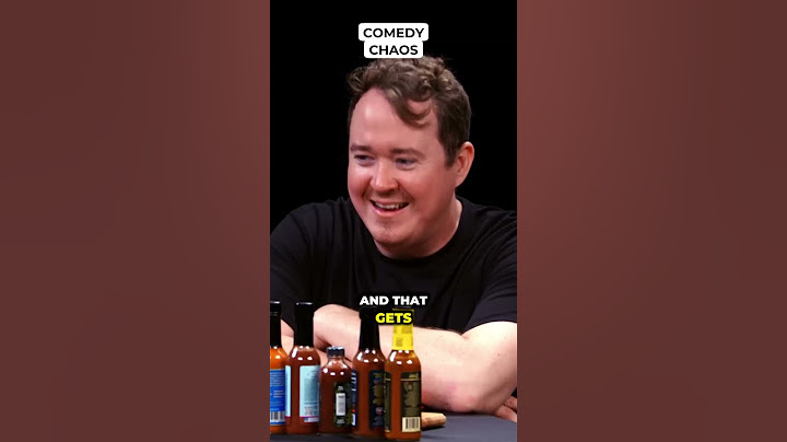 Comedy Chaos Shane Gillis Pounds Milk While Eating Spicy Wings | Hot Ones – Fire, Milk, and Mayhem