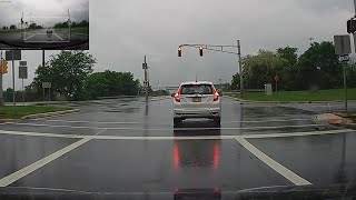 Idiot Driver #37 - Car Slides Halfway Through Intersection