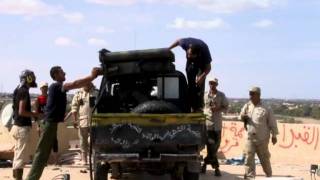 Libya Fighters And Kadhafi Loyalists Resume Battle