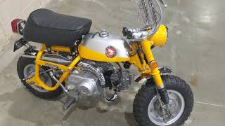 1969 Honda Mini Trail Z50 Vintage motorcycle restored pair at Mecum classic car auction Houston 2021