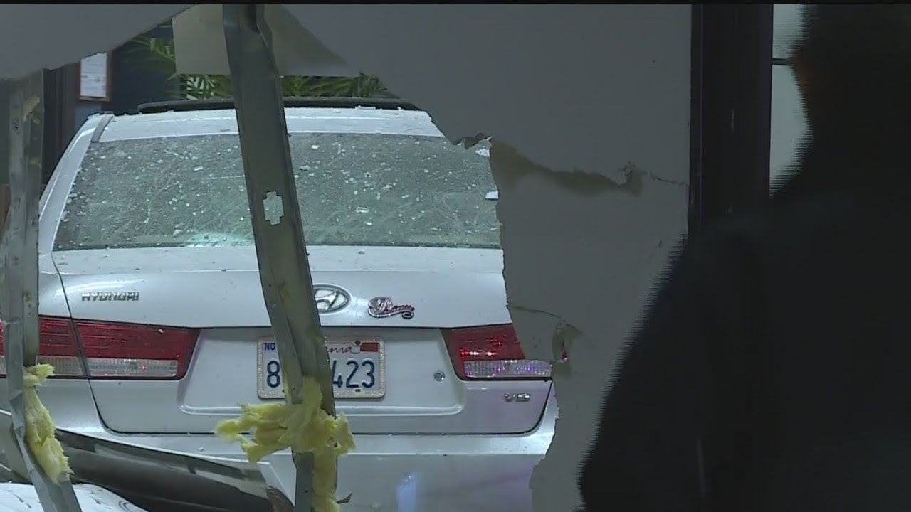 Car Crashes Into Strip Mall, Man Injured - YouTube