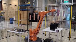 Vision based parts sorting and packing with a robot