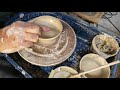 Throwing a ceramic bowl on a pottery wheel