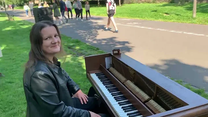 Piano in the park on a sunny August day