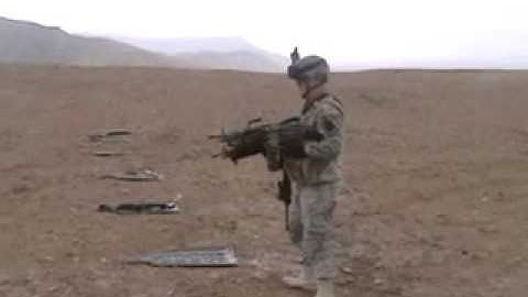 Army Soldier dual wields some M249