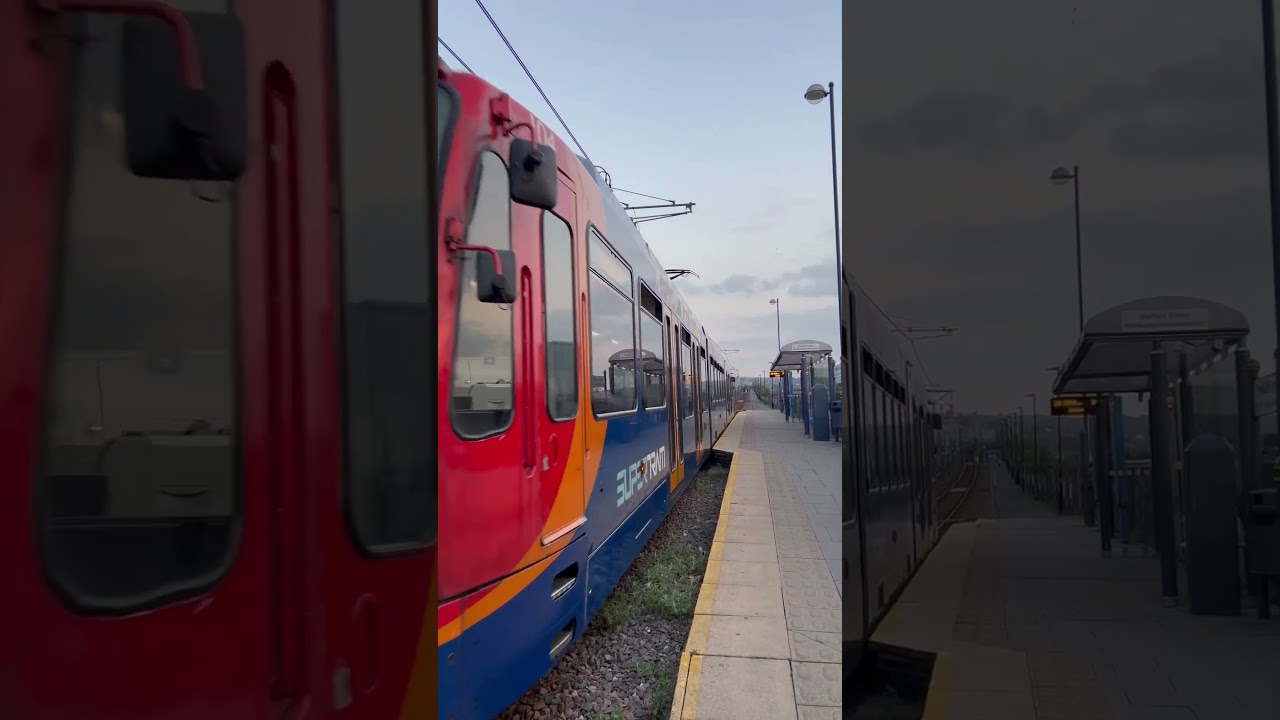 Sheffield Supertram Duewag 104 departing from Sheffield Station on the blue line