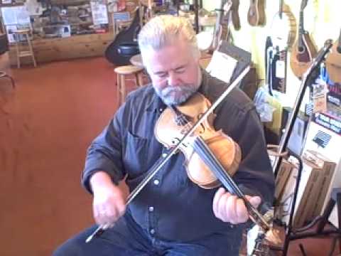 John Pedersen plays fiddle