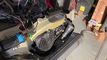 Volkswagen Bus Type 4 Engine with fuel injection on a test run stand.