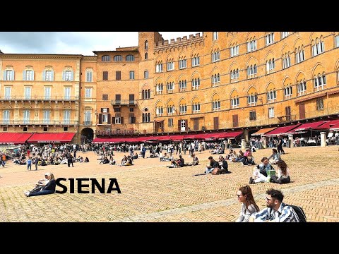 Video: Penerangan dan foto Katedral Siena (Duomo di Siena) - Itali: Siena