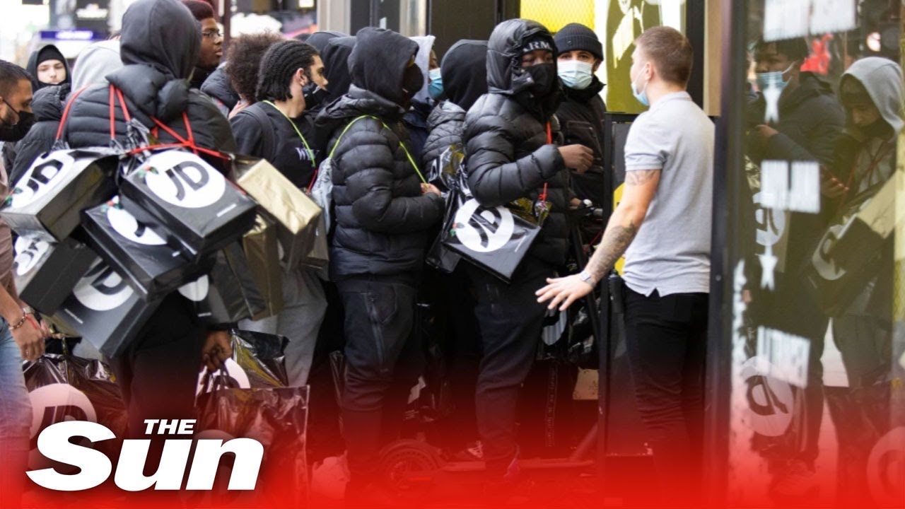 England Covid-19 lockdown ends - Shoppers queue outside from 5am