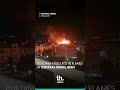 Fire breaks out in Shoham after an Iranian ballistic missile strike during the latest barrage on