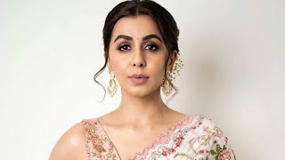 Nikki Galrani looks strikingly gorgeous in an ivory saree at SIIMA-2021! screenshot 2