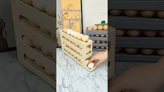 Famous 🥚✨ Keep your eggs fresh and organized with the Automatic RollDown 4-Tier Egg Dispenser!  🧊🚶‍♂️💡 Wealth