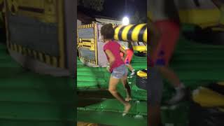 Little girl gets hit on the back of the bead by swinging arm ride at the fair