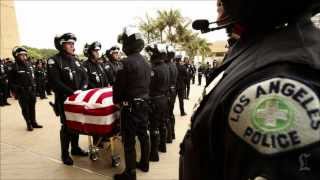 Mourners honor LAPD motorcycle officer at memorial service
