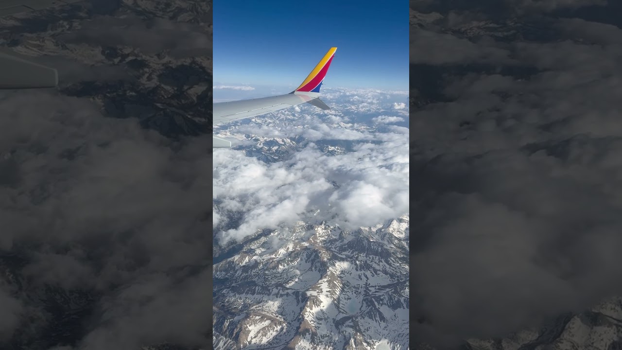 Southwest Airlines 737max8 flying over the snowy mountains 