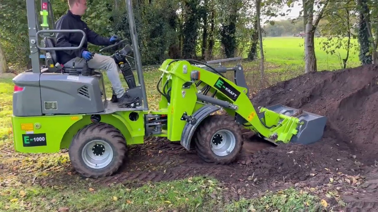 Graaf/zand/grip demonstatie video E1000 minishovel elektrisch